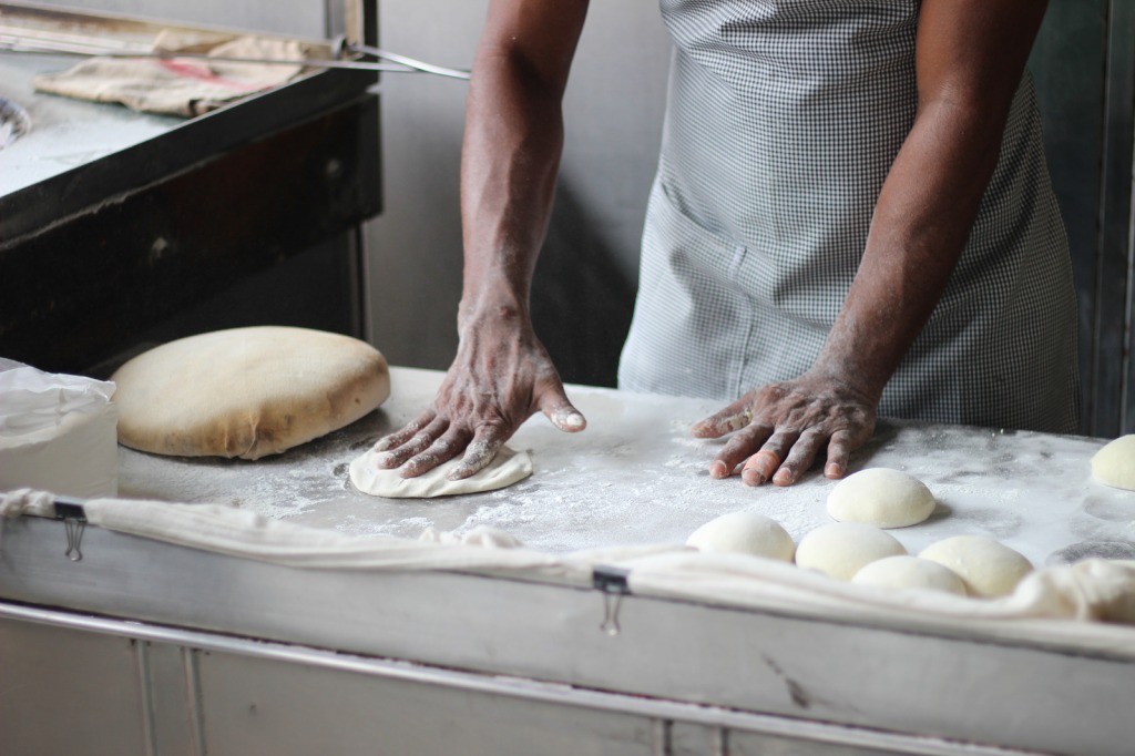 Man making dough in the kitchen